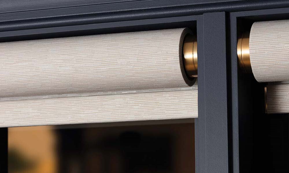 Motorized roller shades